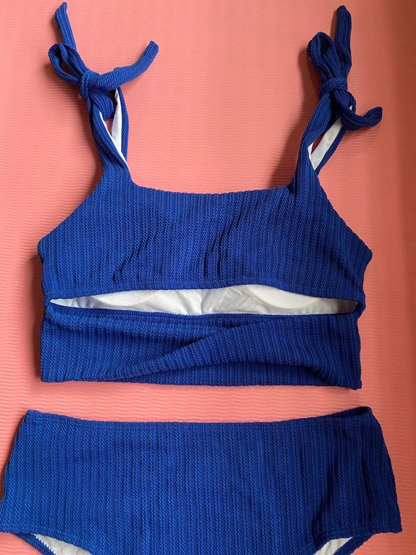BRAND NEW Blue Textured Bikini Set XL (Category: Bikinis & Swimsuits) located in Quezon City. Submitted by prelovedplusnew (Listing ID 1416896812, Image 2). Description: - Brand new - Textured fabric - Top has tie straps - Back detail has minimal ‘X’ design at the lower part - Removable padding -High waist bikini - Size: XL ACTUAL PHOTOS ARE POSTED :).