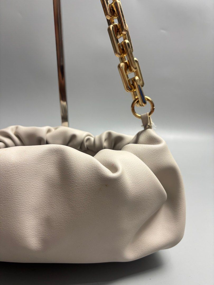 Bottega Veneta The Chain Pouch (Category: Luxury Bags & Wallets) located in Quezon City. Submitted by lucky.purelux.ph (Listing ID 1416932371, Image 2). Description: Bottega Veneta The Chain Pouch in plaster or ecru calfskin leather with gold-tone hardware. Free shipping within Metro Manila Additional shipping charges for provincial deliveries Please read the description before buying MOP: gcash, bank transfer (bpi) Courier: J&T, lalamove Please 