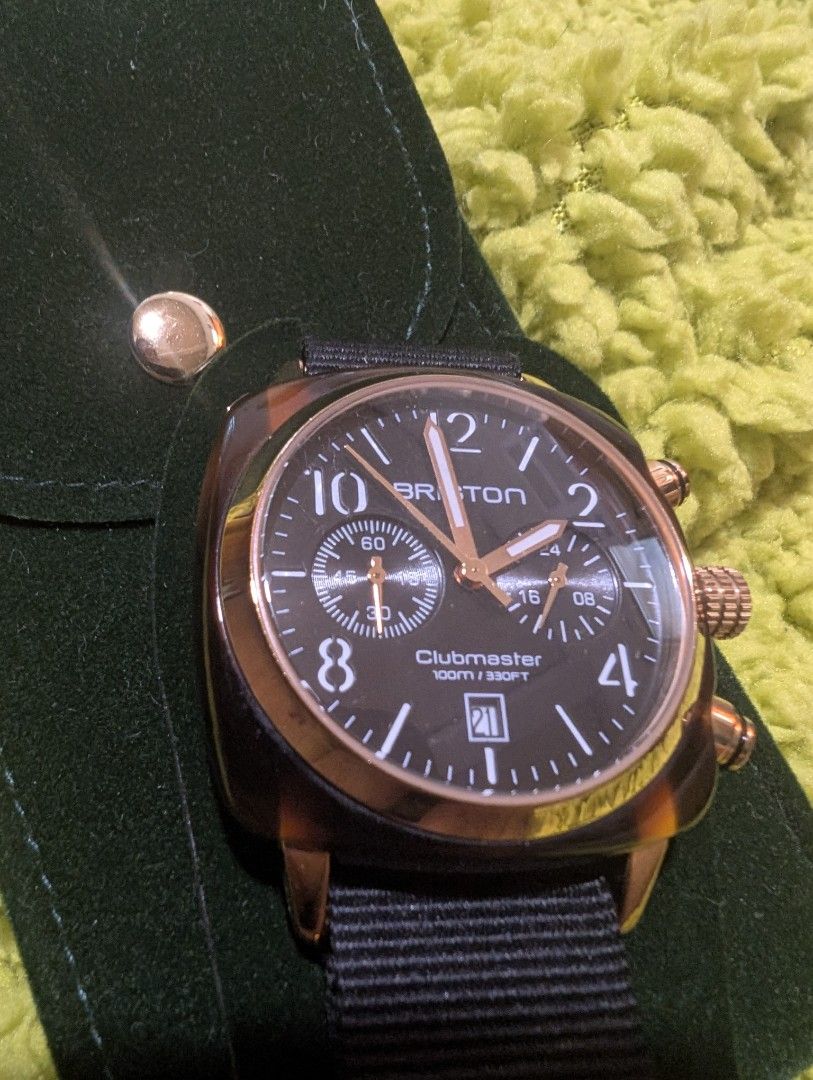 Briston Clubmaster Chronograph Watch (Category: Men's Watches) located in Muntinlupa City. Submitted by luckyfrogzone (Listing ID 1416892029, Image 2). Description: Briston Clubmaster chronograph watch with a black strap and a rose gold case. The watch features a date display and multiple sub-dials. The watch is accompanied by a green pouch. The strap has a rose gold buckle with the Briston logo..