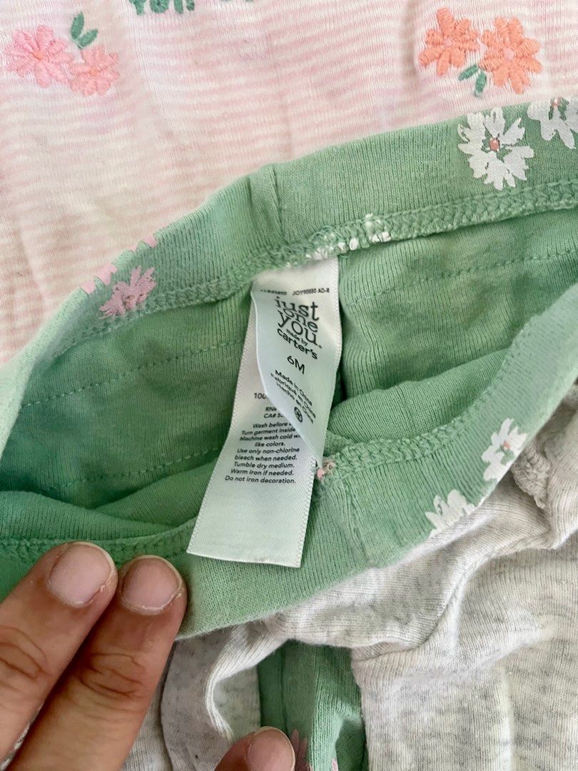 Carter's Baby Clothes Set TAKE ALL (Category: Babies & Kids Fashion) located in Manila. Submitted by carlaoller (Listing ID 1416865599, Image 3). Description: Adorable baby clothes set from Carter's, size 6M. Includes a mint green polka dot onesie, a pink floral onesie, a gray bear onesie, a pink striped top with green floral pants, a white floral top with black polka dot pants. Perfect for your little one!.