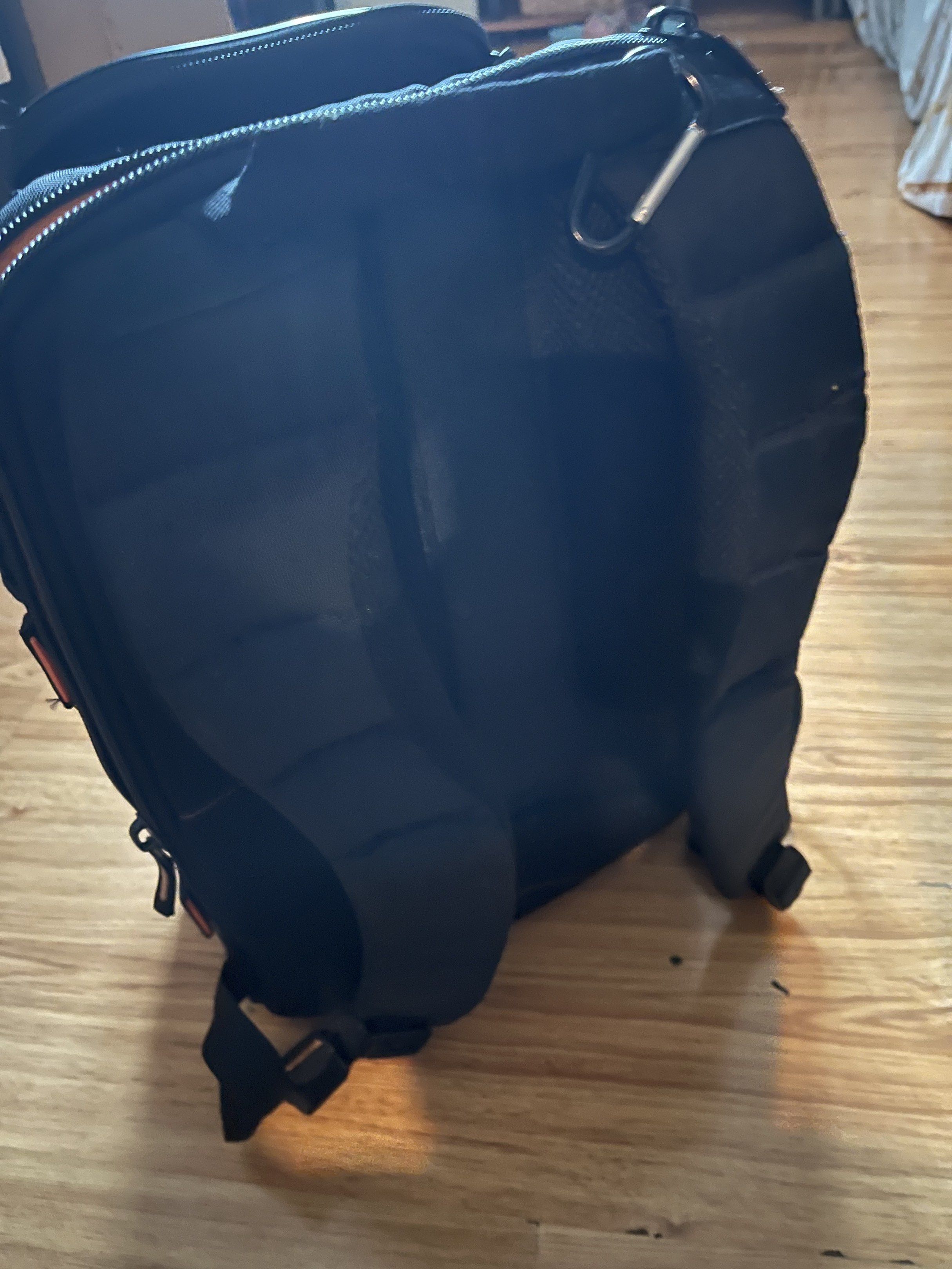 Case Logic Camera Backpack (Category: Camera Bags & Carriers) located in Pasig City. Submitted by wilsonwill38327 (Listing ID 1416887269, Image 3). Description: - Black Case Logic camera backpack - Multiple compartments and orange interior - Padded back and adjustable straps for comfort - Includes dividers and padded inserts for camera gear - Front and side pockets for accessories This is a used item but still functional and still in pleasant con