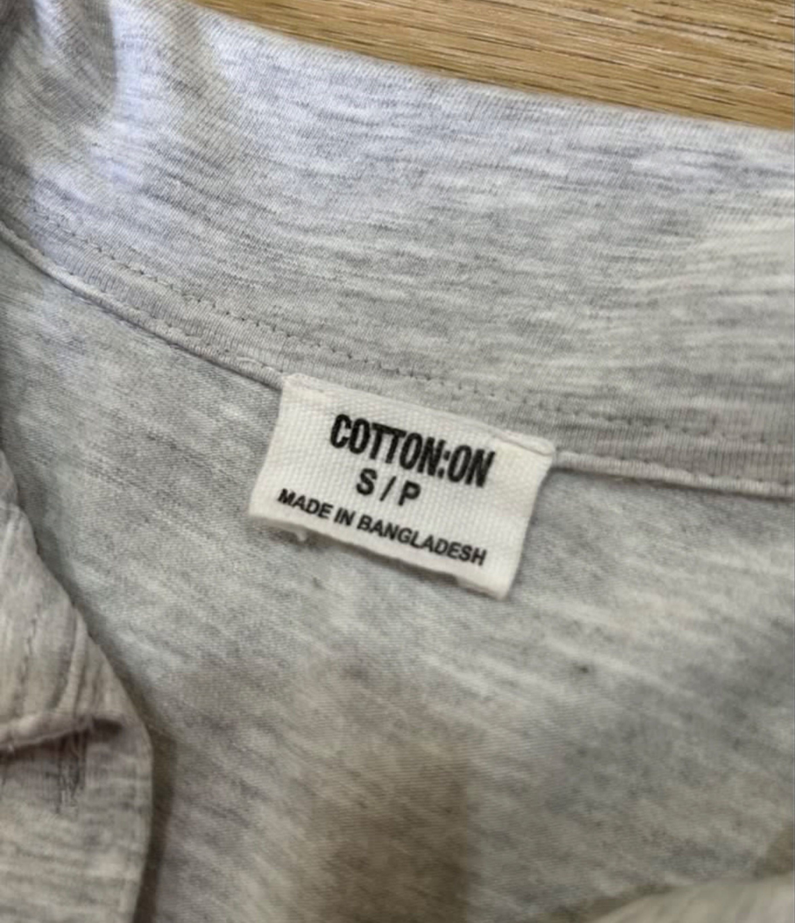 Cotton On Polo Shirt (Category: Shirts) located in Binan City. Submitted by supanovaaa (Listing ID 1416906730, Image 2). Description: - Cotton On polo shirt - Light gray color - Size: S Dimensions (in inches) L: 17.5 W: 15.