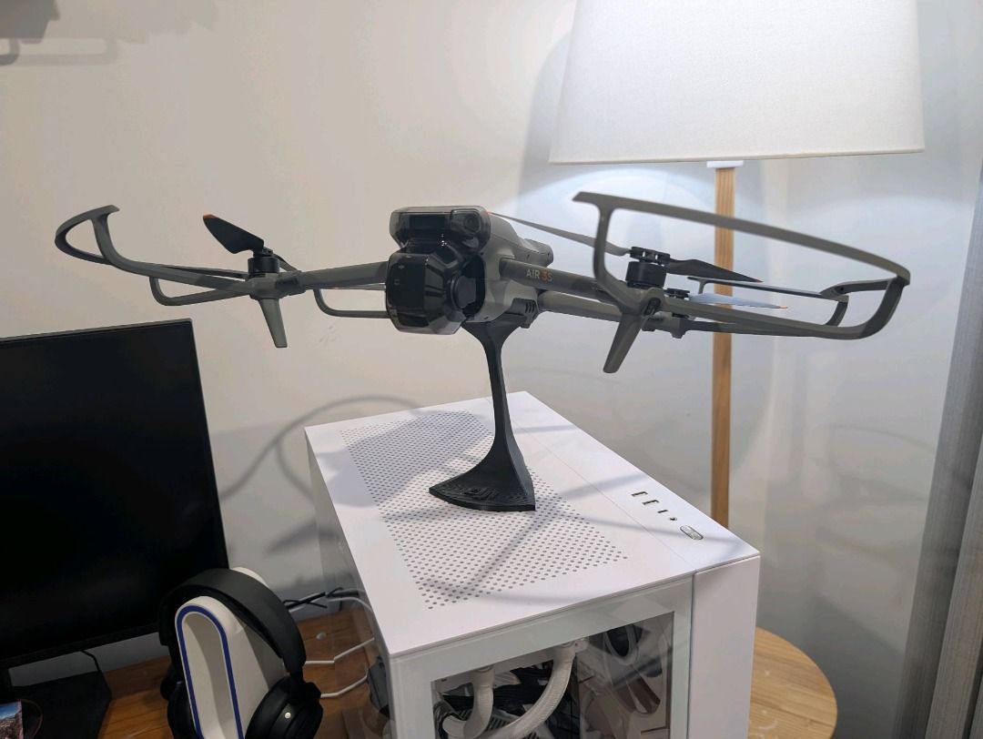 Dji Mavic Air 3 / 3s table stand (Category: Drones) located in Mandaluyong City. Submitted by heyitslaaaance (Listing ID 1416887084, Image 2). Description: Selling a DJI Mavic Air 3 / Air 3S Table Display Stand, designed to hold the drone in a stable, elevated flight pose for tabletop or shelf display. This stand gives the Mavic Air 3 / 3S a modern, showroom‑quality look, making it ideal for desk setups, studios, retail displays, collectors, or c