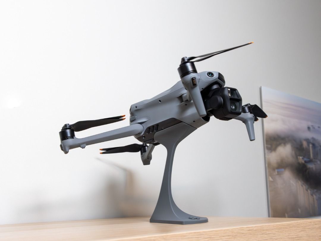 Dji Mavic Air 3 / 3s table stand (Category: Drones) located in Mandaluyong City. Submitted by heyitslaaaance (Listing ID 1416887084, Image 3). Description: Selling a DJI Mavic Air 3 / Air 3S Table Display Stand, designed to hold the drone in a stable, elevated flight pose for tabletop or shelf display. This stand gives the Mavic Air 3 / 3S a modern, showroom‑quality look, making it ideal for desk setups, studios, retail displays, collectors, or c