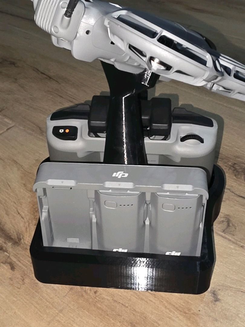 DJI Neo 2 Fly More Combo Display Stand (All‑in‑One Display Base) (Category: Drones) located in Mandaluyong City. Submitted by heyitslaaaance (Listing ID 1416887982, Image 1). Description: Selling a DJI Neo 2 Fly More Combo Display Stand, designed to store and showcase the Neo 2 drone, DJI controller, and accessories in one organized, premium display. This all‑in‑one stand holds the drone in an elevated flight pose, while securely docking the cont