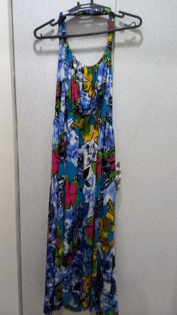 Floral Print Maxi Dress (Category: Dresses) located in Manila. Submitted by miss66449 (Listing ID 1416986267, Image 1). Description: - Floral print maxi dress - Colors: Blue, yellow, and pink - Halter neckline - Flowing, comfortable silhouette - Lightweight fabric - Ideal for casual wear and beach days.