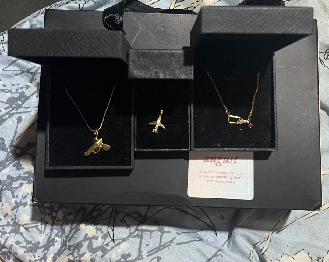 FREE SF | Tala by Kyla Necklaces (Category: Necklaces) located in Baguio. Submitted by the.lostwardrobe (Listing ID 1416991982, Image 1). Description: TALA by Kyla Necklaces - with OG jewelry box though may minor flaw sa isang box Inclusion: - 2 necklaces (Taylor Swift Insp. August and handgun pendant) - It also includes an airplane pendant only - includes cloth for cleaning (fron tala) - includes keychains (from tala) php 300 shipped .