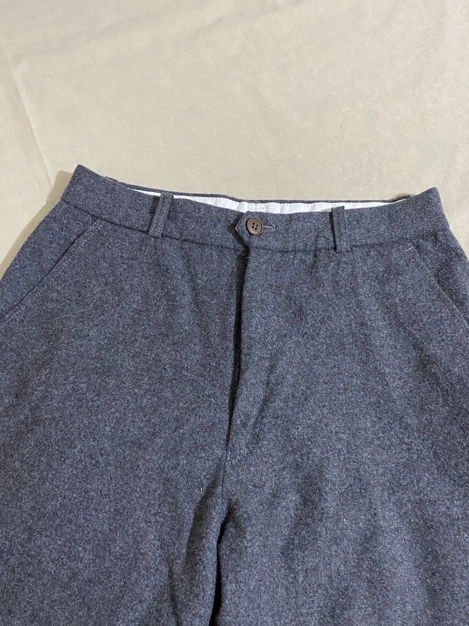 Gray Trouser (Category: Other Bottoms) located in Caloocan City. Submitted by kheiclutter (Listing ID 1416915093, Image 2). Description: - Gray wool pants - Classic design - Button closure - Tailored fit - Textured wool fabric - Straight leg cut - Suitable for casual and formal occasions.