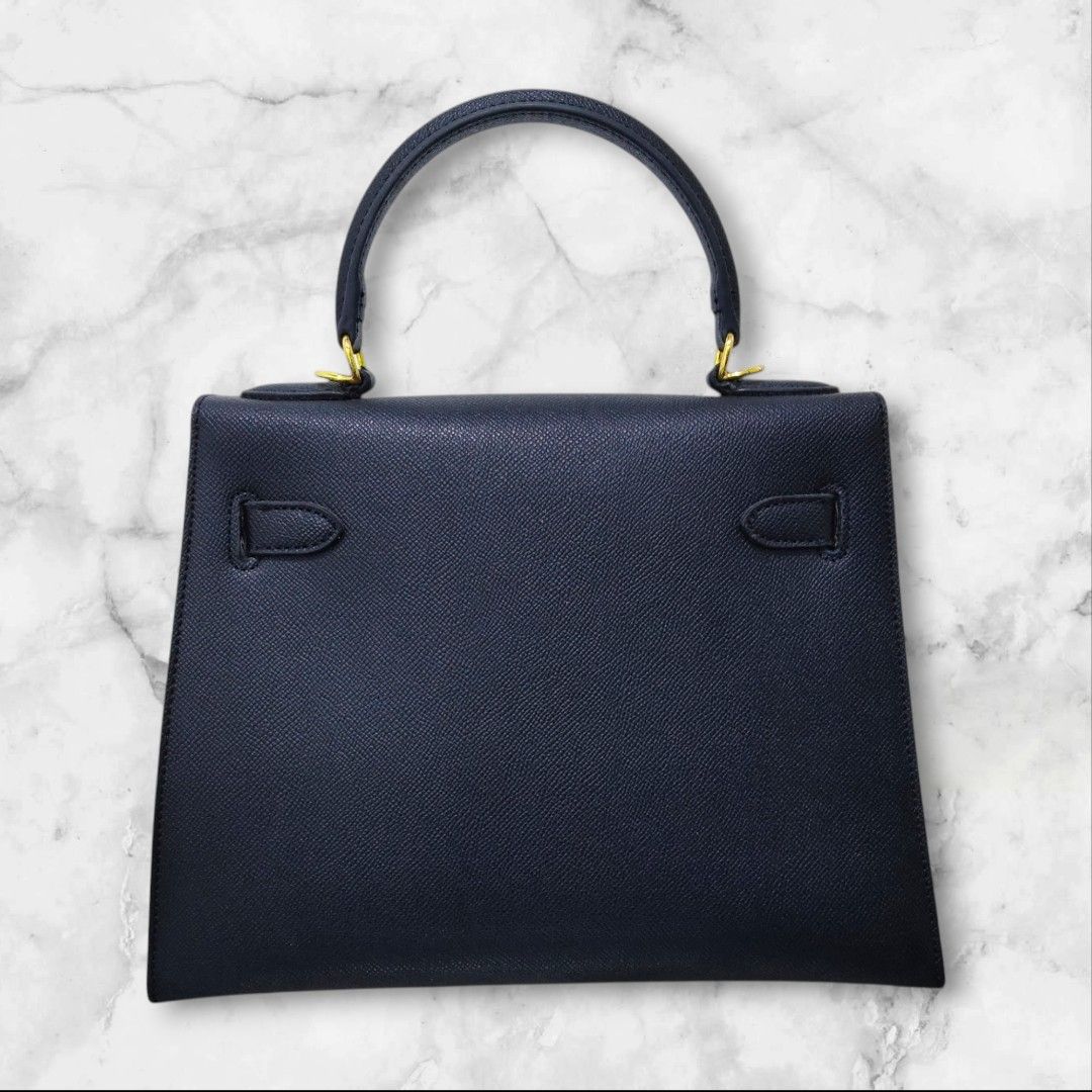 Hermes Kelly 28 (Category: Luxury Bags & Wallets) located in Quezon City. Submitted by carol.hera (Listing ID 1416925154, Image 3). Description: Hermes Kelly ( 28 CM ) Like new NO ISSUES NO LOGOS Conclusion - straps Payment First ☺️ MOD jnt, lalamove meet up for nearby PM FOR MORE INFO Disclaimer: This account is not affiliated with the brand. All copyrights remain to the original brand holder. .