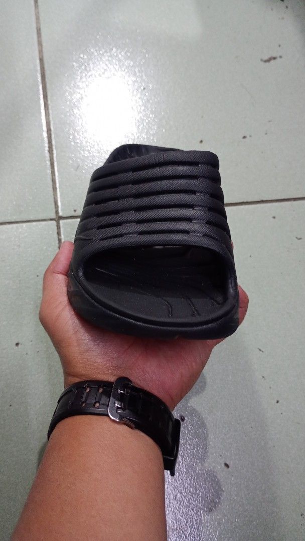 Hoka One One Black Sandals(23 cm) (Category: Flats & Sandals) located in Baguio. Submitted by brand_master (Listing ID 1416968271, Image 3). Description: Authentic Hoka One One Women's ORA Recovery Slide 2(6 US L) - Black - Slip-on design for easy wear - Features a textured footbed for grip - Thick, cushioned sole for comfort - Durable synthetic material - Hoka One One logo visible Thick outsole Minimal sign of usage In excellent condition .