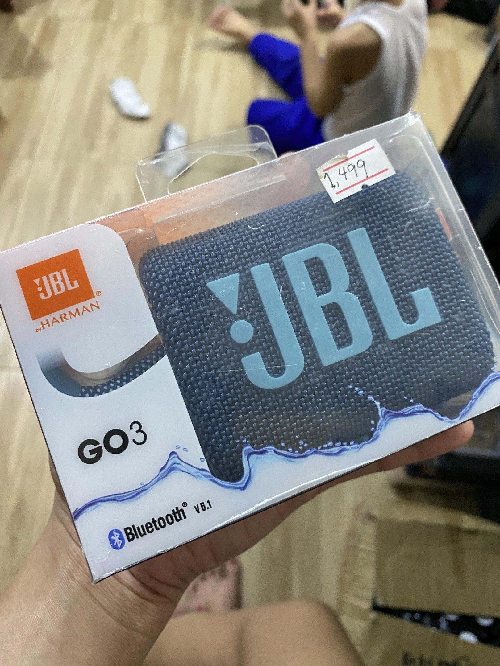 JBL GO 3 Bluetooth Speaker (Category: Soundbars, Speakers & Amplifiers) located in Quezon City. Submitted by ruffaguill89470 (Listing ID 1416866066, Image 1). Description: JBL GO 3 is a compact and portable Bluetooth speaker. It features Bluetooth 5.1 connectivity. The speaker is in its original packaging. The price tag shows 1,499. The speaker has the JBL logo on the front..