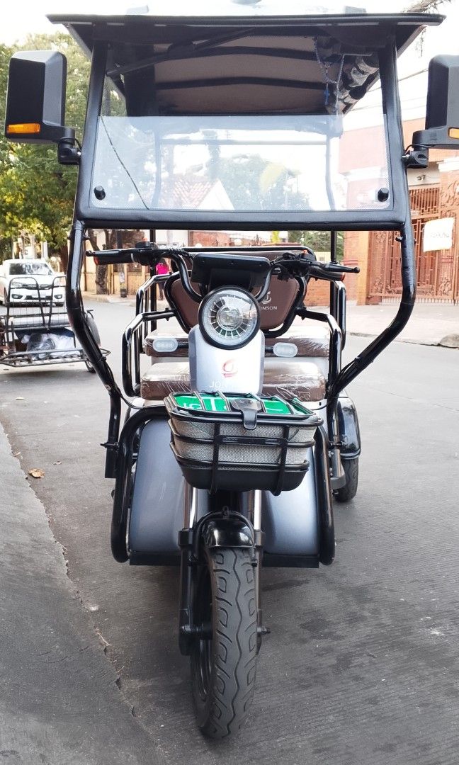 Jonson Electric Bike/Trike (Category: Everything Else Others) located in Paranaque City. Submitted by hizonrj_g (Listing ID 1417001833, Image 3). Description: Jonson Electric Bike/Trike 3 months used good as new Large screen LCD LED headlights 3 speed with reverse Heavy duty dual batteries (driver seat) Built-in audio system Large under passenger seat compartment Audible turn signals & reverse *Must see to appreciate* RFS: will upgrade to a four-