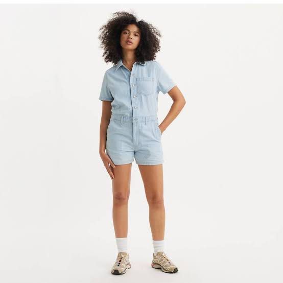 Levi's Pre-loved Denim Romper (Category: Rompers) located in Quezon City. Submitted by muradito_01 (Listing ID 1416857270, Image 1). Description: - Levi's denim romper - Light blue color - Collared neckline - Short sleeves - Button-down front - Chest pocket - Shorts-style bottoms - Fitted waist - Durable denim material - Perfect for casual wear.