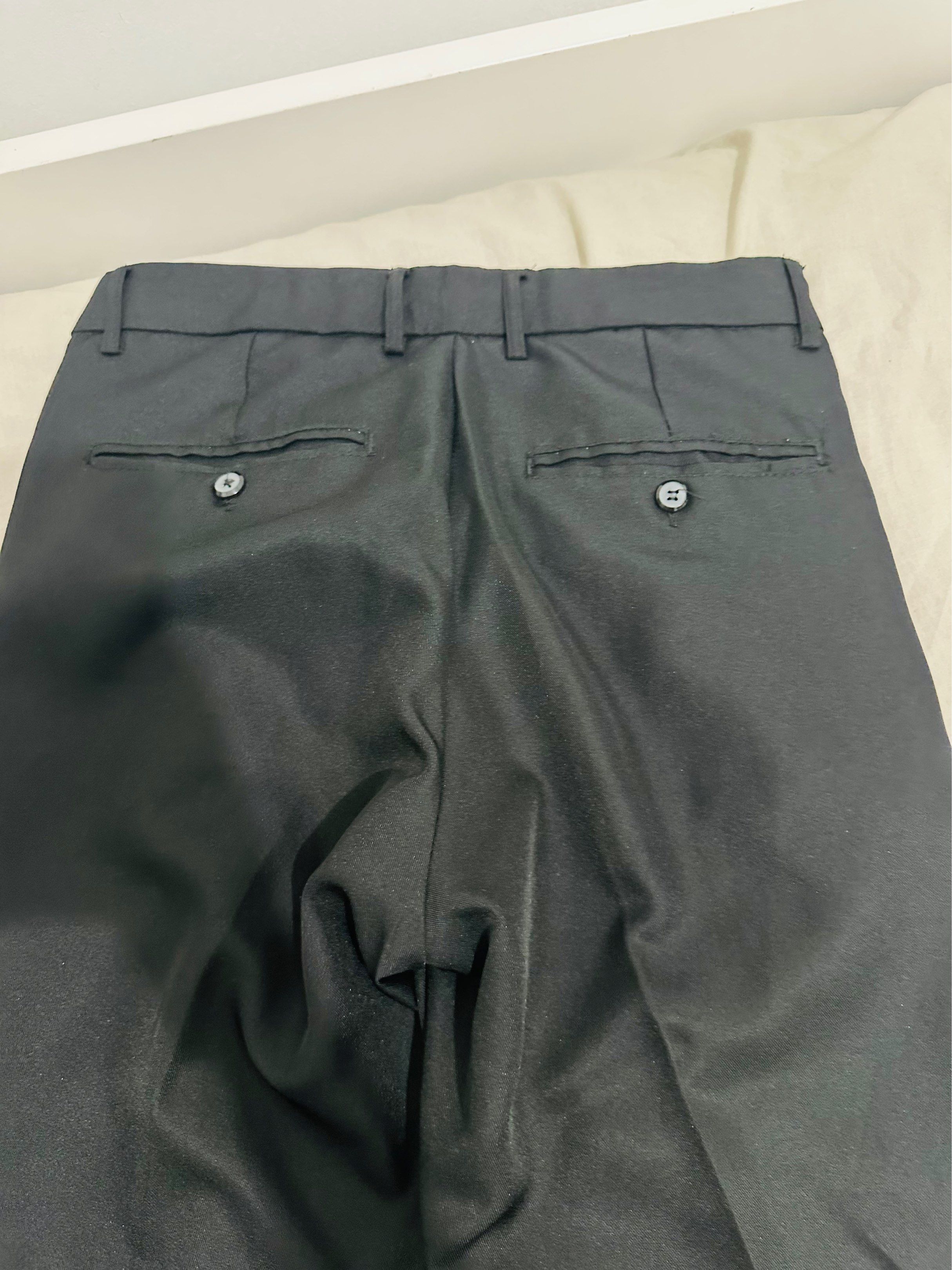 Main Street Black Pants Size 30 (Category: Jeans) located in Taguig. Submitted by ImpulzBuyer (Listing ID 1416964851, Image 3). Description: - Black Main Street pants - Size 30 waist - Classic straight-leg cut - Two back pockets with button closures - Made of smooth, solid fabric.
