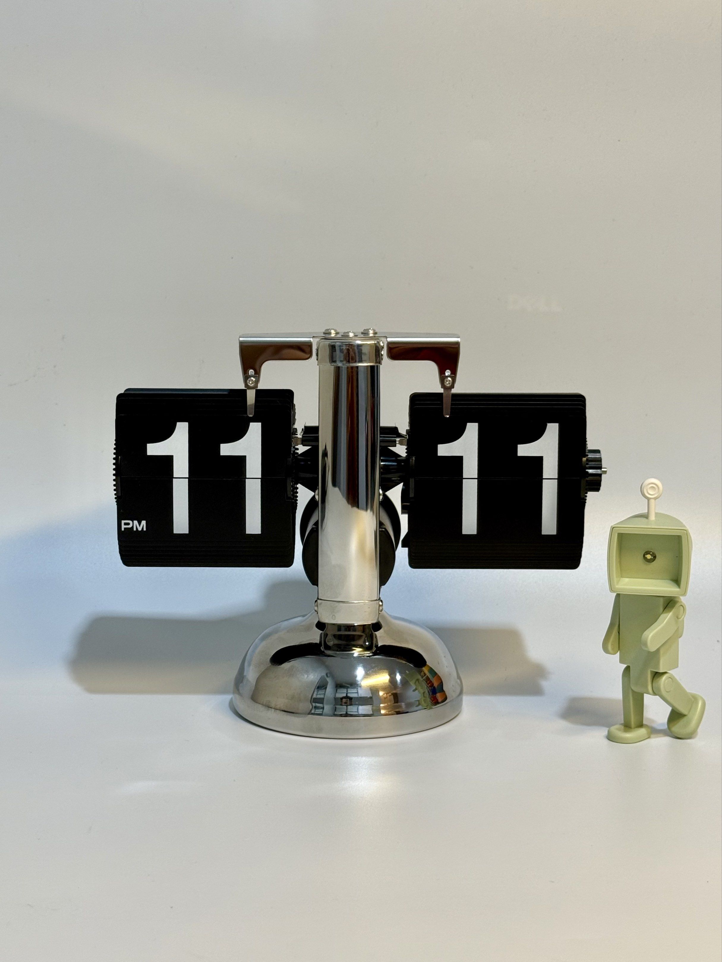 Mechanical Retro Clock Automatic Page Turning (Category: Clocks) located in Manila. Submitted by staylit.ph (Listing ID 1417003063, Image 1). Description: Mechanical Retro Clock Automatic Page Turning • PhP 2,650 (Brand New) • Dimensions: 8.3”Base x 3.2”Width x 6.3”Height • Features: Mechanical Movement, Automatic Flipping • Materials: Polished Chrome Metal, Matte Black PVC Dials • Styles: Mid-Century Modern, Retro, Futurism, Space Age, Minimalis