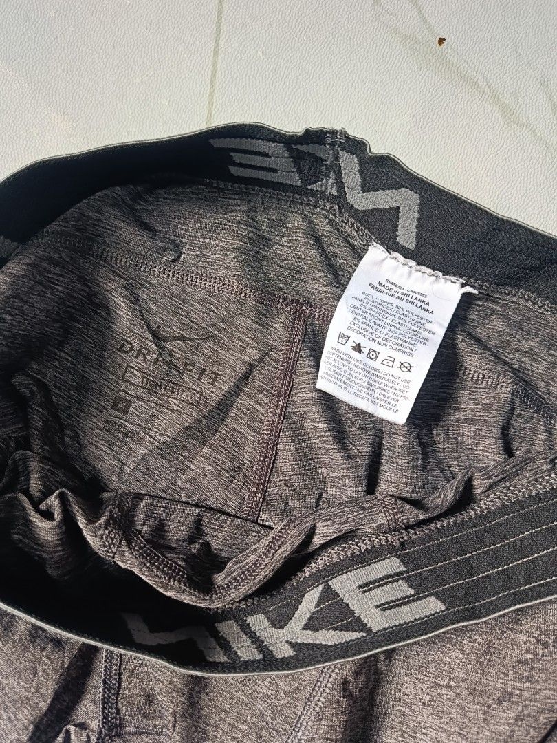 Nike Victory Dri-Fit Grey Black Compression Pants (Category: Activewear) located in Rosario. Submitted by livj. (Listing ID 1416901453, Image 3). Description: - Nike Pro Dri-FIT compression pants - Gray and black color scheme - Nike logo on leg and waistband - Size Medium tag is visible.