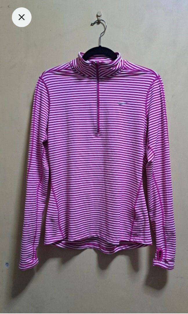 Nike Pro Dri-fit Longsleeves (Category: Activewear) located in Manila. Submitted by thrifter_lifestyle (Listing ID 1416890146, Image 1). Description: Brand: Nike Fully stretchable and sweat absorbent Material as indicated in tag Color: Hot Pink & White Stipes 💕 Perfect for running 🏃‍♀️ Barely worn! rfs: no longer fits, no worn photos..