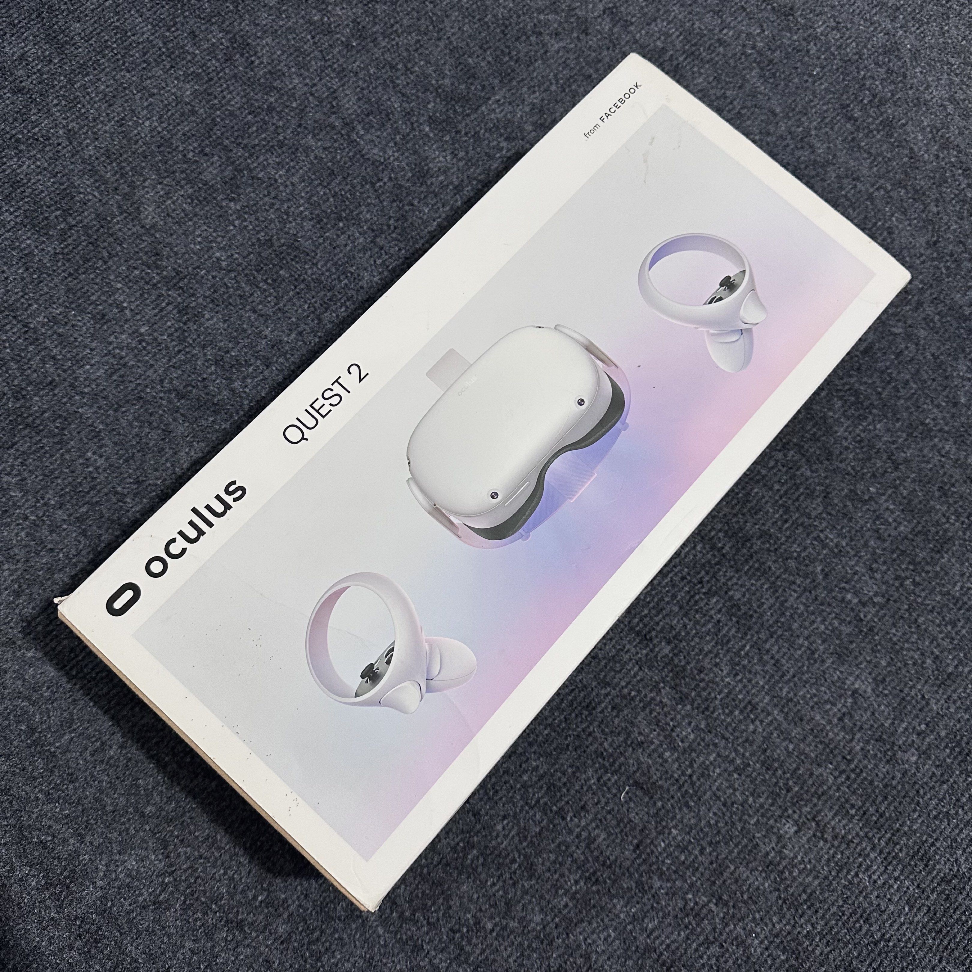 Oculus Quest 2 VR Headset 64GB (Category: Others) located in Taguig. Submitted by nopenotjo (Listing ID 1416972970, Image 2). Description: - Oculus Quest 2 VR headset 64GB - Includes: Headset, two controllers, charging cable, and original box - Color: White .