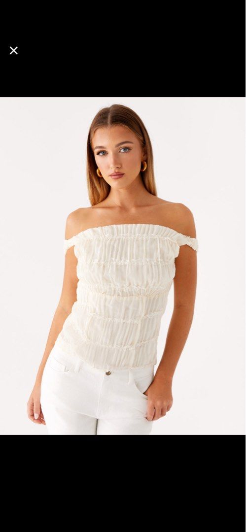 Peppermayo Nebula Top - Ivory (Category: Blouses) located in Taguig. Submitted by user51982 (Listing ID 1416959569, Image 1). Description: - Cream off-shoulder top - Ruched design - Fitted silhouette - Flattering neckline - Lightweight fabric - Ideal for warm weather - Pairs well with jeans or skirts.