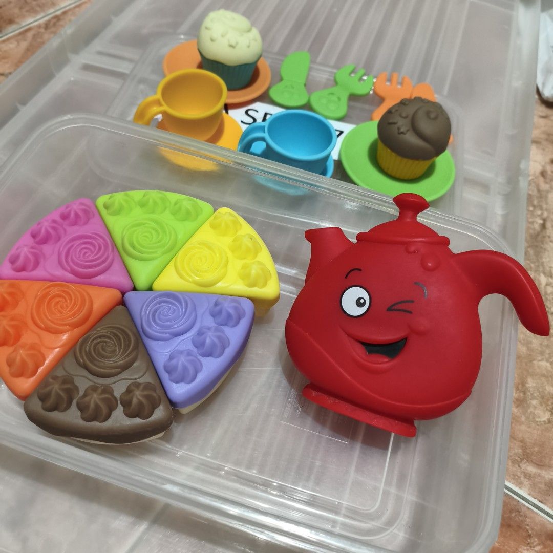 PlayGo Soft Toy Tea Set (Category: Kids Toys) located in Tuguegarao City. Submitted by annelimitedshop (Listing ID 1416969792, Image 1). Description: -PLAYGO SOFT TOY 27-piece toy tea set - Includes: red teapot, cake slices, cupcakes, cups, saucers, and utensils - Comes in a clear plastic container for easy storage - Perfect for imaginative play and tea parties - Features vibrant colors and fun designs Not breakable. excellent quality ang ginamit