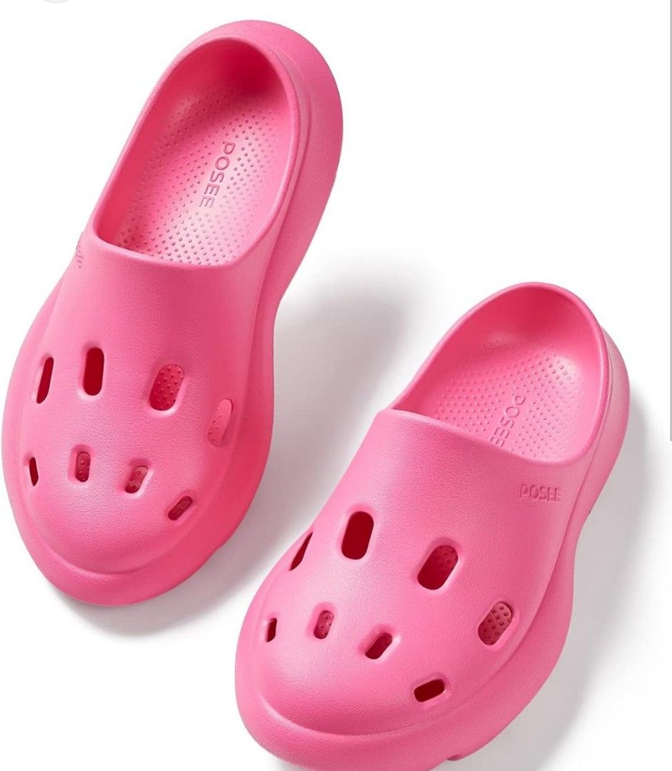 Posee Fushia Pink Clogs (Category: Slippers and slides) located in Bocaue. Submitted by michellesell_2 (Listing ID 1417000228, Image 1). Description: These pink clogs feature a chunky platform sole and a slip-on design. They have multiple ventilation holes on the upper. The brand name "Posee" is visible on the insole. These clogs are perfect for casual wear and offer a comfortable fit. - NOT USED. NEW. .