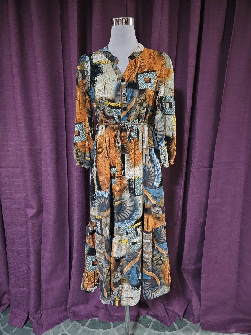 Printed Dress (Category: Dresses) located in Silang. Submitted by a.r.a_15 (Listing ID 1415095208, Image 2). Description: - Unique print in orange, blue, and white - Collared neckline - Fitted silhouette - Lightweight fabric - Short sleeves - Knee-length hemline - Cinched waist.