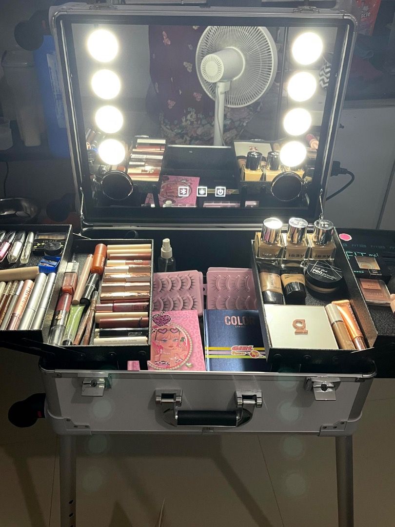 Professional Makeup Case with Lights and Speaker (Category: Makeup) located in Makati City. Submitted by jujubacardi (Listing ID 1416935472, Image 3). Description: Used less than 10x Rfs:decluttee -Professional makeup case - Built-in lights and mirror - Multiple compartments and drawers - On legs for easy setup - Ideal for makeup artists and enthusiasts.