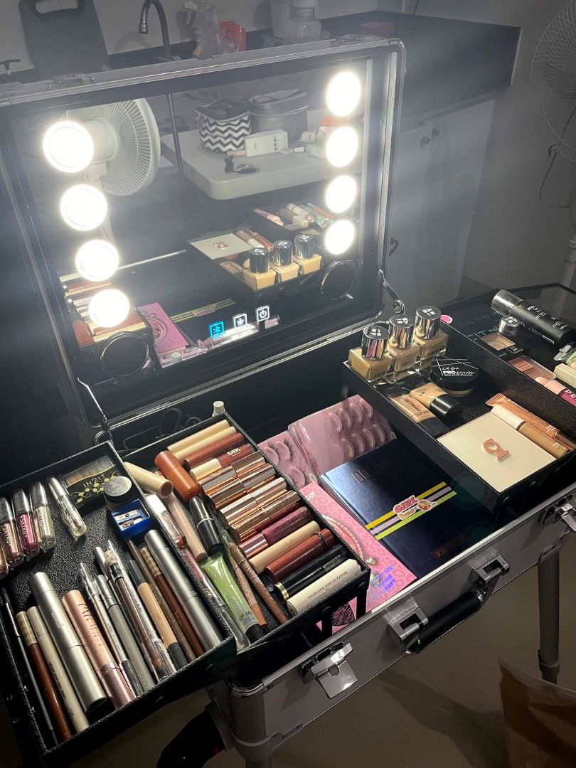 Professional Makeup Case with Lights and Speaker (Category: Makeup) located in Makati City. Submitted by jujubacardi (Listing ID 1416935472, Image 1). Description: Used less than 10x Rfs:decluttee -Professional makeup case - Built-in lights and mirror - Multiple compartments and drawers - On legs for easy setup - Ideal for makeup artists and enthusiasts.