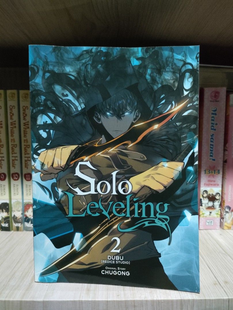 Solo Leveling Manga Volume 1 & 2 (Category: Comics & Manga) located in Subic. Submitted by qatqat (Listing ID 1417022073, Image 2). Description: - Solo Leveling Manhwa: Volumes 1 & 2 - Language: English -Official copy from Yen Press - Only displayed on shelf -Condition: 9/10 with minor issue on spine -₱900 each (can be negotiable if bought as set) -Sf is separate You can also chat me on the blue: Qatrina Adriano or orange app.