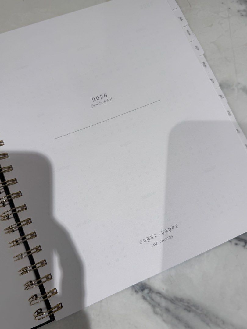 Sugar Paper 2026 Weekly Planner Agenda Large (Category: Stationery & School Supplies) located in Manila. Submitted by helloseptembermnl (Listing ID 1416866770, Image 3). Description: - 2026 Sugar Paper Planner - Weekly and monthly agenda - Spiral binding - Sections for personal, health, work, and financial goals - Space for important dates - Teal cover with gold accents - Features the quote: "Start each day with a grateful heart".