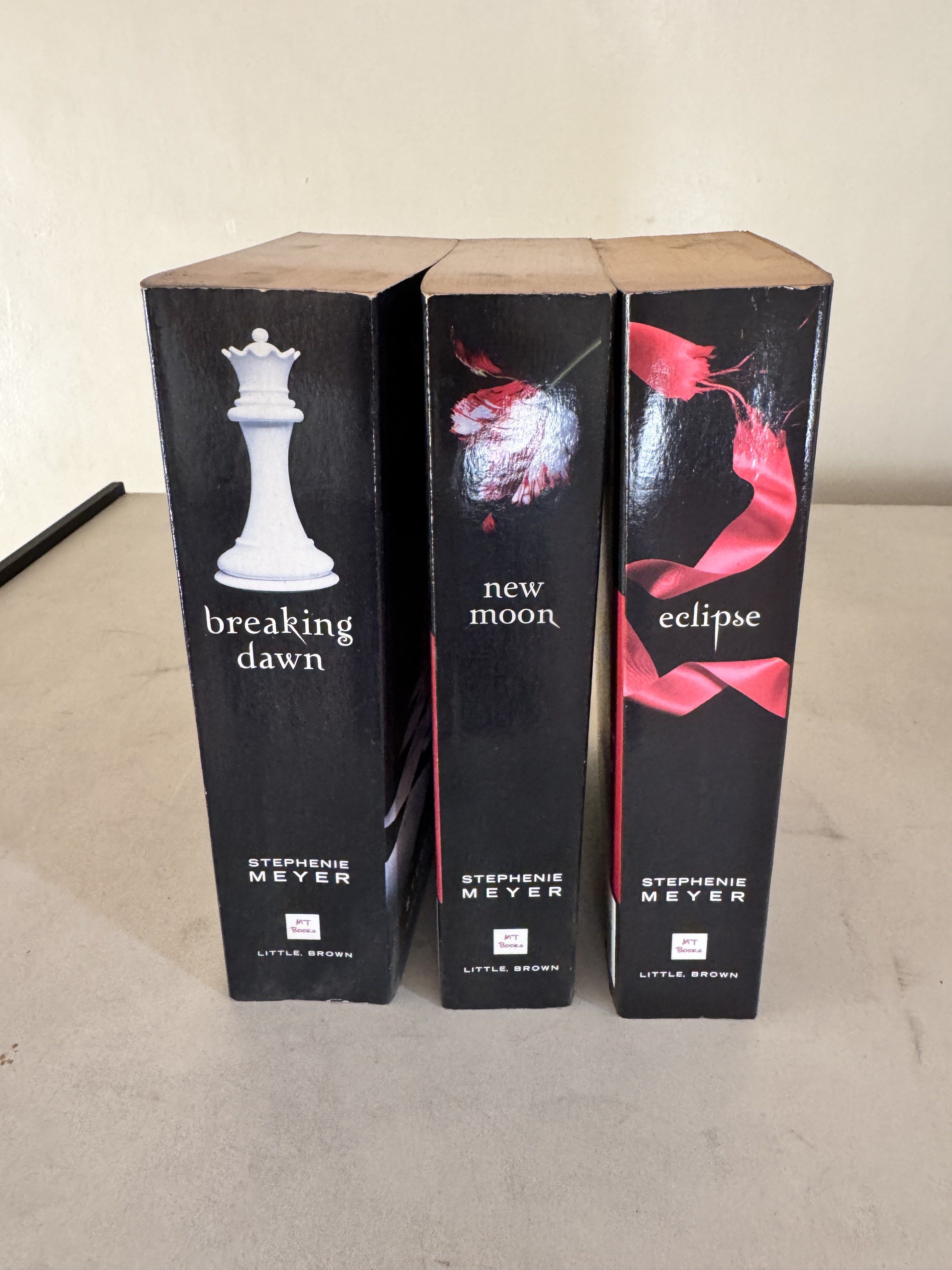 Twilight Saga Books by Stephenie Meyer (Category: Storybooks) located in Quezon City. Submitted by harristhegoldenboy (Listing ID 1417024302, Image 1). Description: - Twilight Saga book set - Includes "Breaking Dawn", "New Moon", and "Eclipse" - Published by Little Brown - Features iconic cover art - Perfect for Twilight fans RFS decluttering.