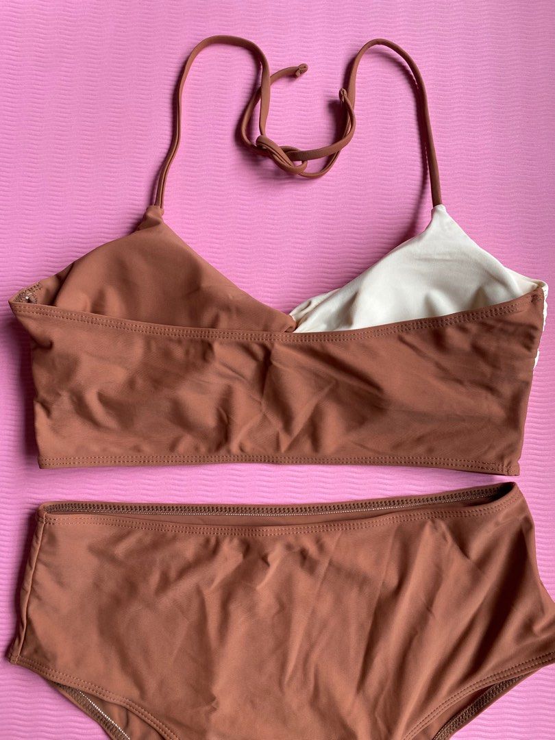 BRAND NEW Two-Piece Halter Bikini - Size L (Category: Bikinis & Swimsuits) located in Quezon City. Submitted by prelovedplusnew (Listing ID 1416897798, Image 2). Description: - Two-piece bikini set - Size: L - Top: Halter style with color-block design (brown & cream) - Bottoms: High-waisted, solid brown - Removable padding ACTUAL PHOTOS ARE POSTED :).