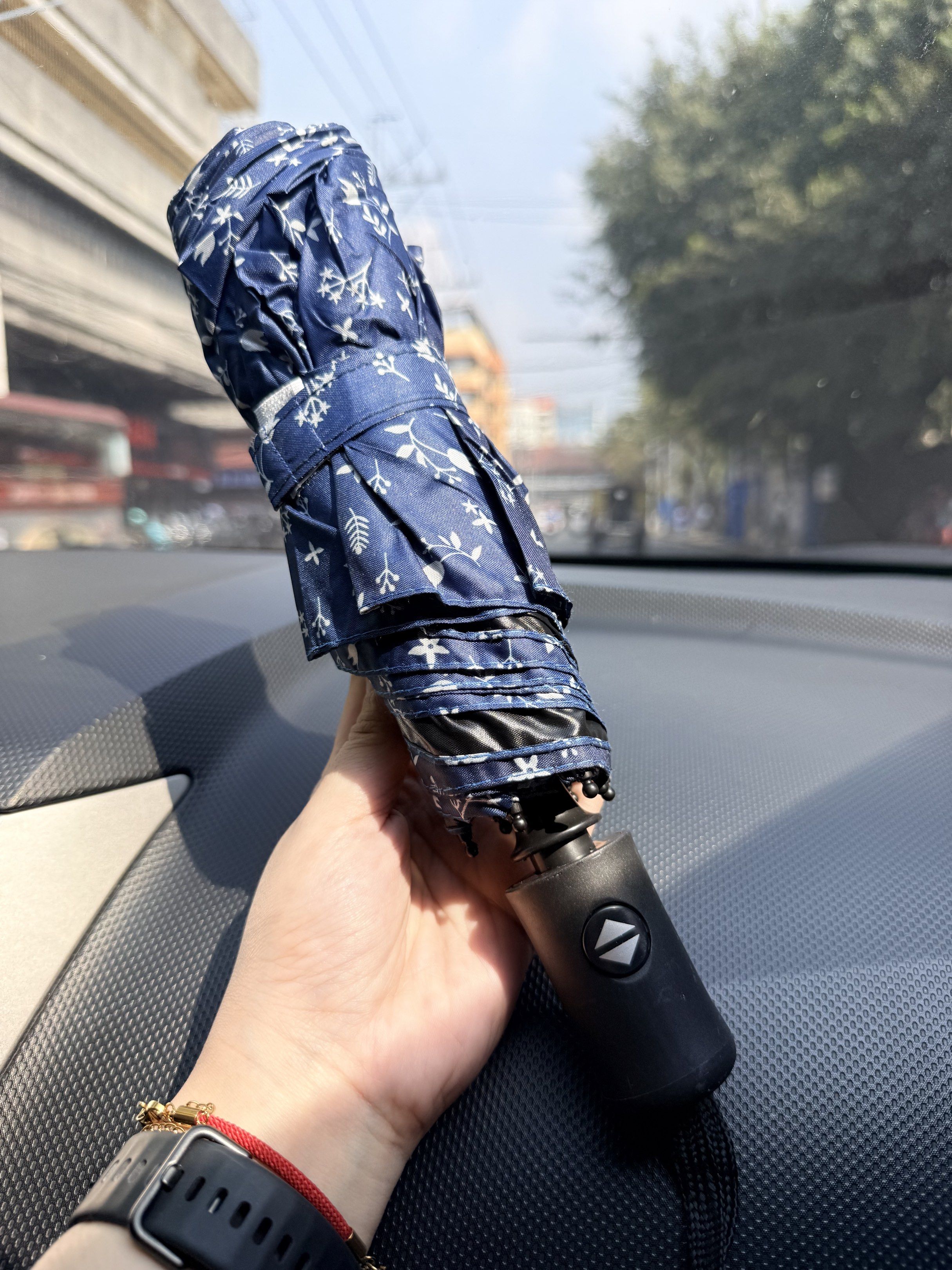 UV Protection Folding Umbrella (Category: Umbrellas) located in Manila. Submitted by hpshop2020 (Listing ID 1416915872, Image 1). Description: - UV Protection - Black handle with easy open/close button - Available Colors/Patterns: Blue floral, beige, black, and more! - Compact and easy to carry - Perfect for sun protection.