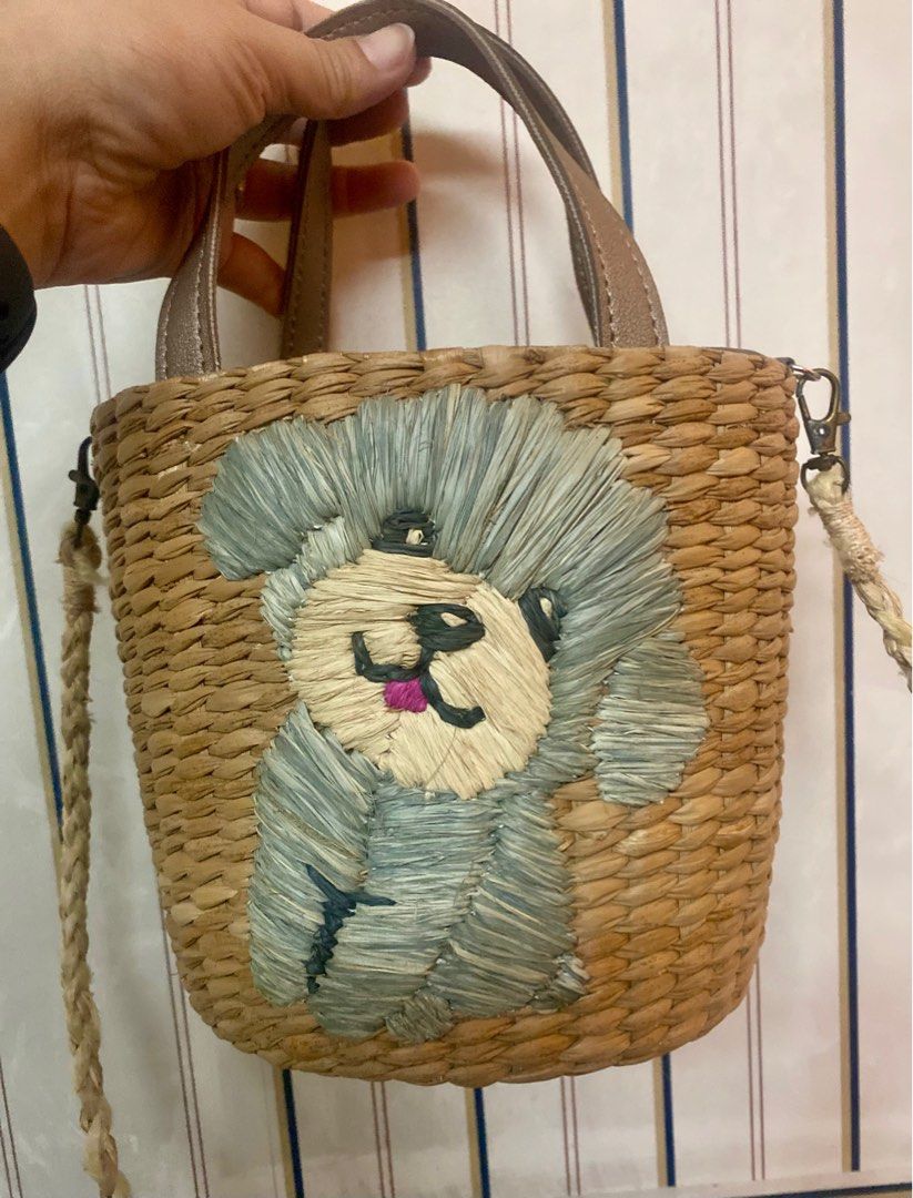 Woven Abaca Dog Design Handbag with Shoulder Strap (Category: Shoulder Bags) located in Makati City. Submitted by sweetsj (Listing ID 1416961920, Image 1). Description: - Adorable handbag with a woven design - Features a cute dog face - Top handle and detachable shoulder strap included - Zippered main compartment for security - Neutral-colored interior lining - Made of woven material - no issues. Only used twice .