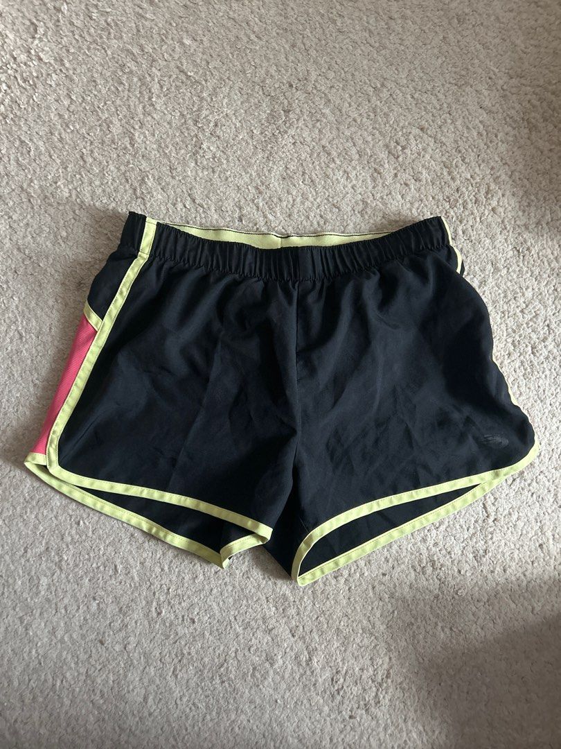 X-Small New Balance Running Shorts (Category: Shorts) located in Taguig. Submitted by rcdeclutter (Listing ID 1416913652, Image 1). Description: - Black running shorts, size XS - Neon green and pink accents - Lightweight material - Inner lining - Drawstring closure - Neon green waistband - Small logo on waistband.
