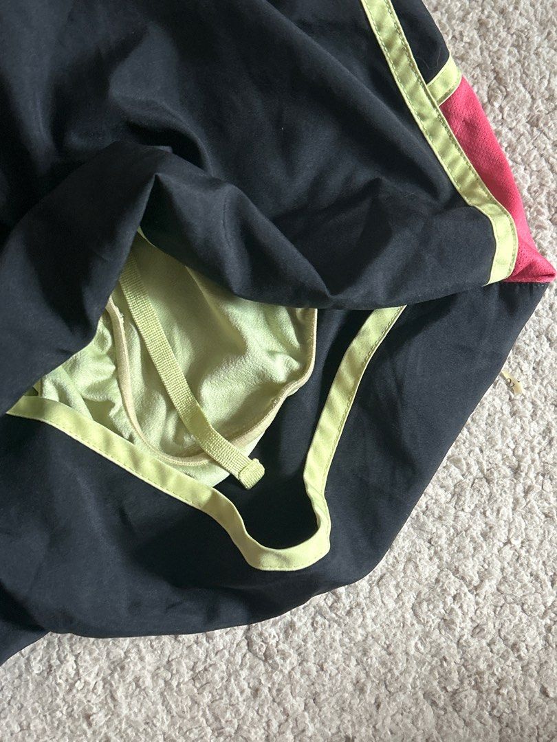 X-Small New Balance Running Shorts (Category: Shorts) located in Taguig. Submitted by rcdeclutter (Listing ID 1416913652, Image 3). Description: - Black running shorts, size XS - Neon green and pink accents - Lightweight material - Inner lining - Drawstring closure - Neon green waistband - Small logo on waistband.