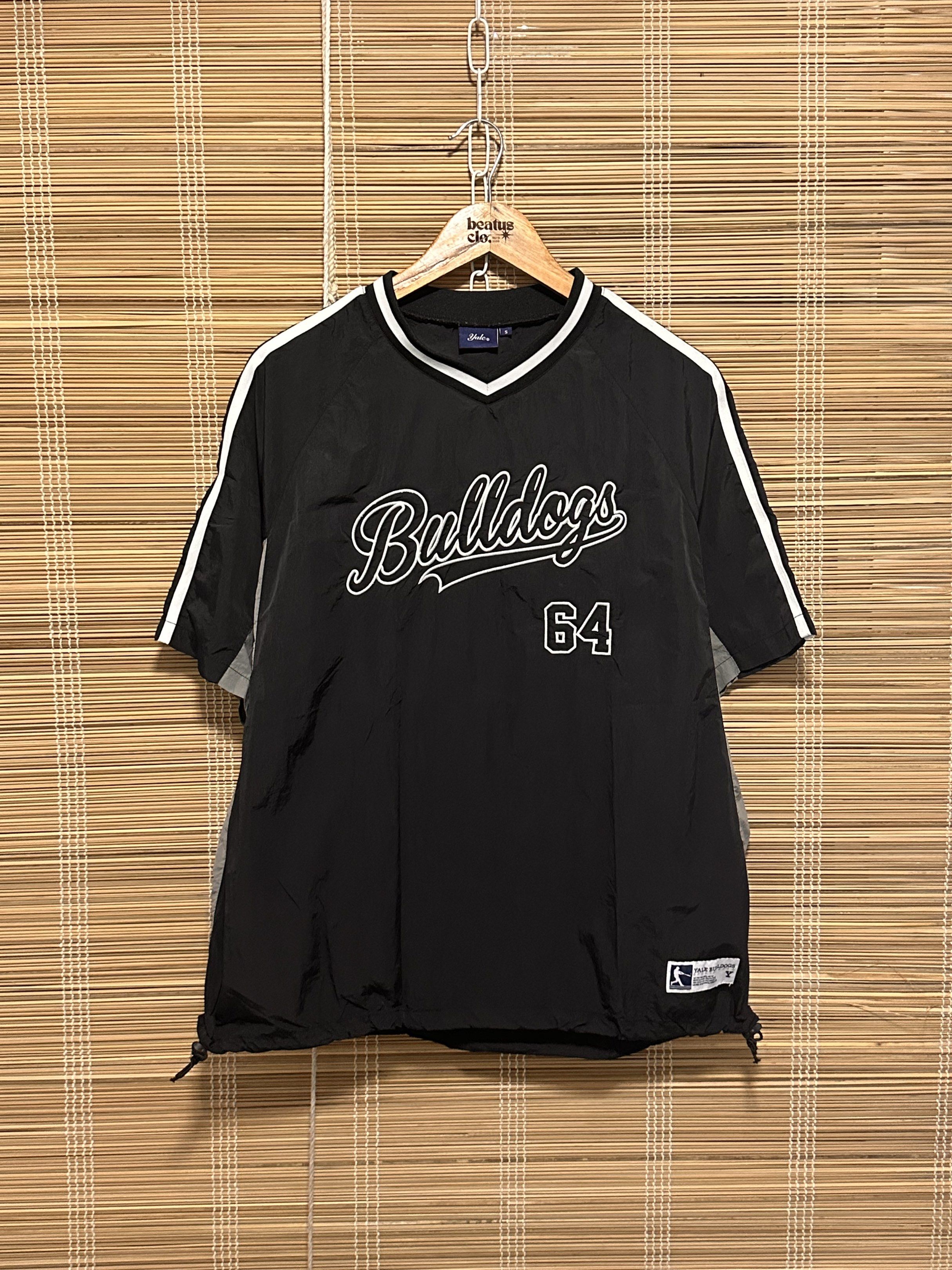Yale Black Jacket - Size S (Category: Coats, Jackets and Outerwear) located in Manila. Submitted by 404archive_ (Listing ID 1416880670, Image 1). Description: - Yale black jacket - Size: S - Design: V-neck with white stripes on collar - Material: Smooth, possibly nylon-like - Features Yale brand label.