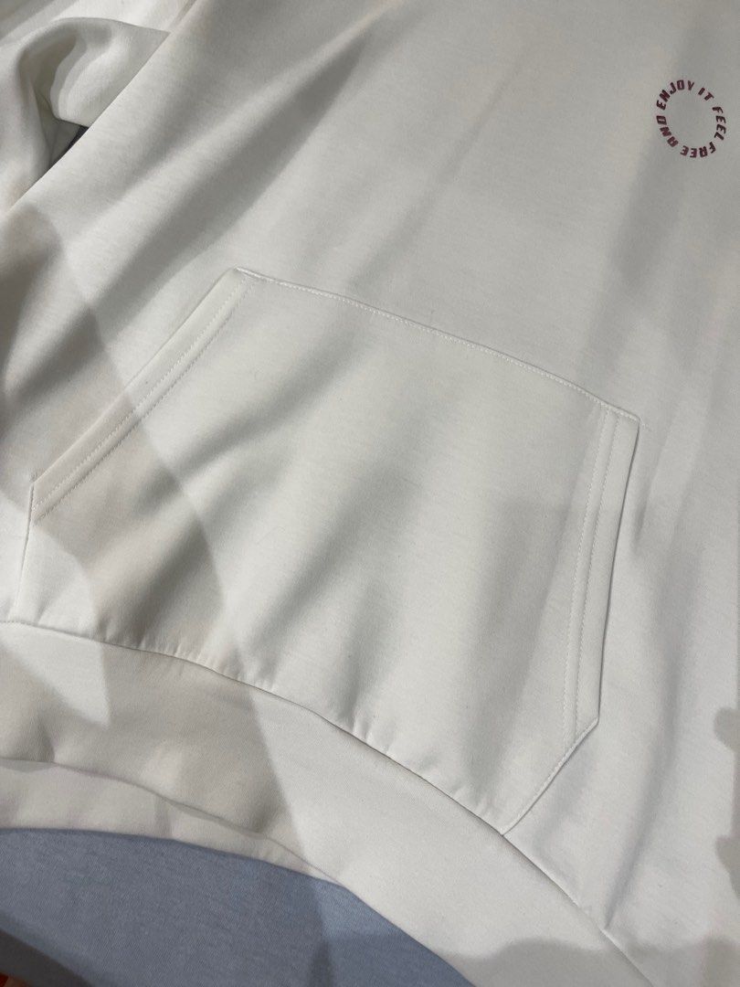 Zara White Hoodie Size 10 (Category: Coats, Jackets and Outerwear) located in Manila. Submitted by dailystuff.ph (Listing ID 1416866523, Image 2). Description: - Zara white hoodie - Features a front pocket and hood - Includes a chest print: "ENJOY IT FEEL FREE" - Size: 10 - Made in China.