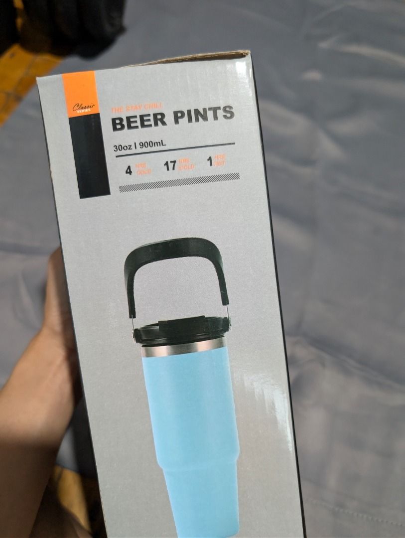30oz Beer Pints Tumbler (Category: Water Bottles & Tumblers) located in Quezon City. Submitted by trainforless (Listing ID 1417144069, Image 3). Description: - Black tumbler - 30oz (900ml) capacity - Features a handle and lid - Includes a purple cup .