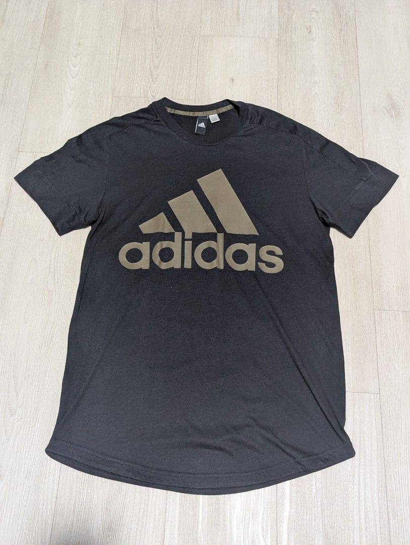 Adidas Graphic Tee - Black (Category: Tshirts & Polo Shirts) located in Singapore. Submitted by javelin777 (Listing ID 1417084267, Image 1). Description: - Adidas t-shirt - Black color - Worn minimally.