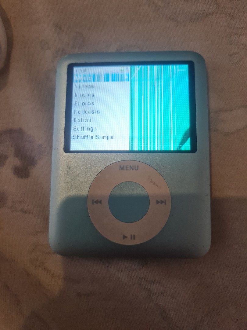 Apple Ipod Nano 3rd generation (Category: Other Gadgets) located in Marikina City. Submitted by wildmoon7459 (Listing ID 1417071348, Image 3). Description: 2 Ipod nano 3rd gen. 1st Ipod working only issue is the lcd screen. lcd screen has lines. battery ok. 2nd Ipod . working. battery ok. lcd ok. yung play/pause bottom need pindutin ng madiin. includes 2 charging cable and im giving in a bluetooth transmitter/receiver so you could connect ipod to