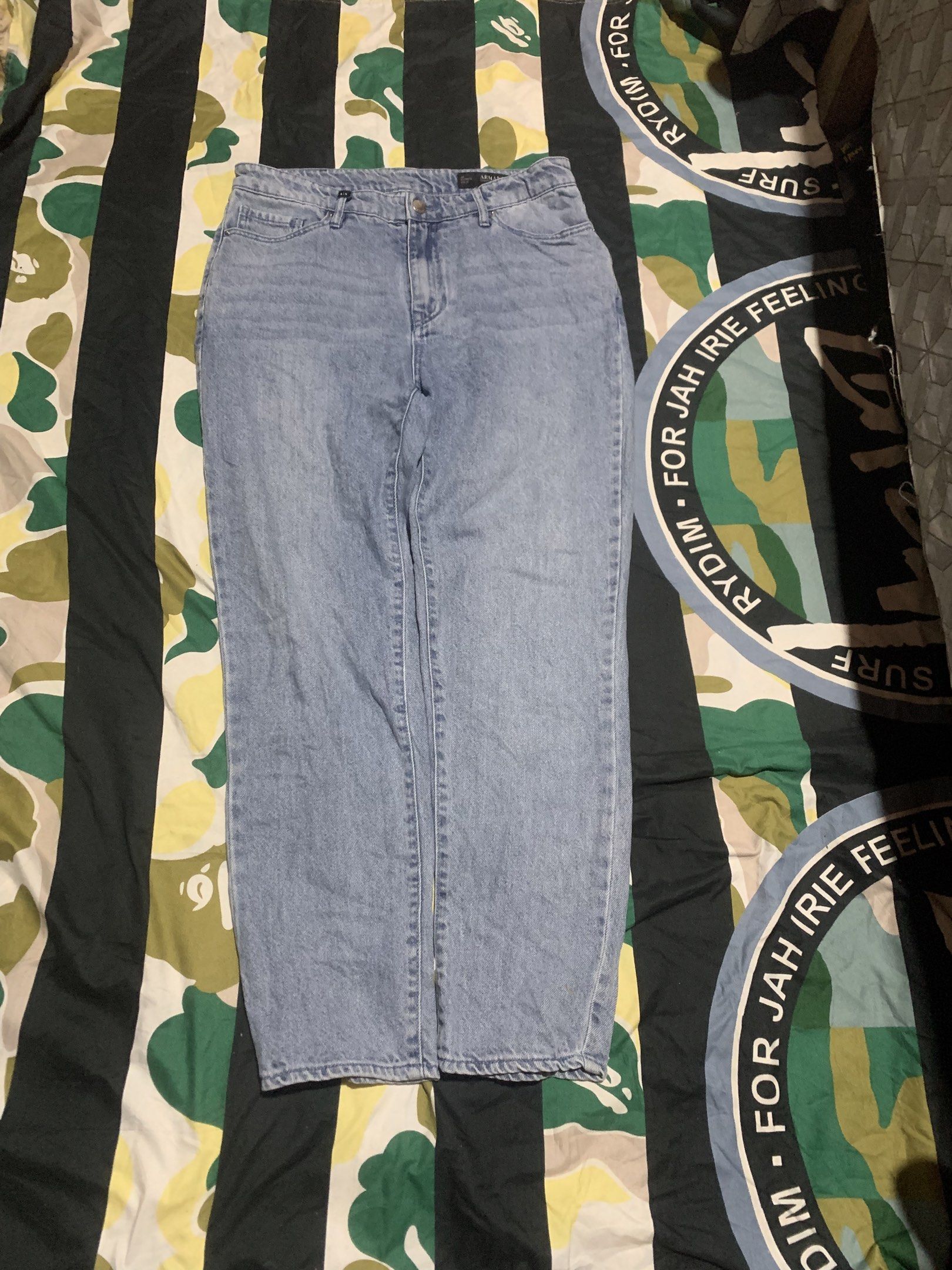 Armani Exchange Boyfriend Jeans Size 28 (Category: Luxury Apparel) located in Cagayan de Oro. Submitted by agboysalis60090 (Listing ID 1417063070, Image 1). Description: Armani Exchange boyfriend jeans in light blue. Features a button closure with the Armani Exchange logo. The jeans have a size 28 waist. The back of the jeans has the Armani Exchange logo. The jeans are made of 100% cotton. There is a small stain on the front of the jeans..