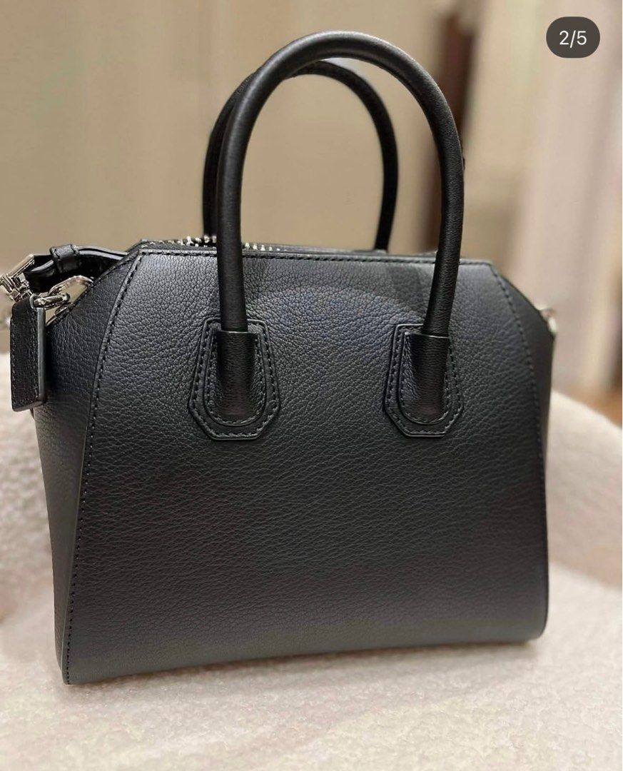 Authentic Givenchy Mini Antigona Complete Inclusion (Category: Luxury Bags & Wallets) located in Quezon City. Submitted by inmycloset03 (Listing ID 1417180973, Image 2). Description: Givenchy Mini Antigona. Pre-loved 9/10 condition. Comes with long strap, dustbag, care cards and leather swatch Location is in qc near ayala cloverleaf and banawe Sf on buyers acc Thanks.