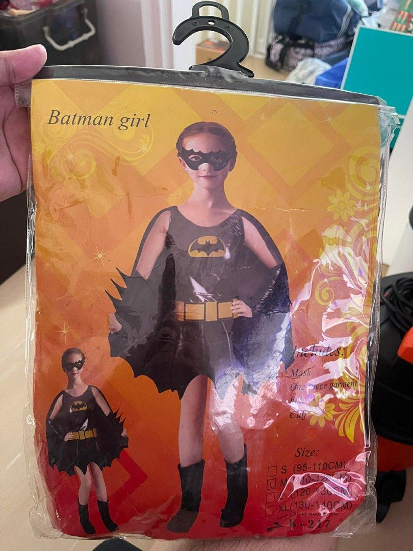 Batman Girl Costume (Category: Babies & Kids Fashion) located in San Pedro. Submitted by goodstogoph (Listing ID 1417030186, Image 1). Description: - Batman girl costume with mask and one-piece garment - Features the iconic Batman logo - sizes: M (120-130CM) 3-4yo - Packaged in a clear plastic bag RFS: tried on, stored and never used. Decluttering. .