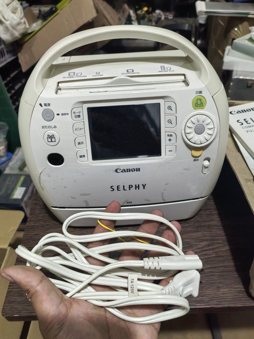 Canon SELPHY ES3 Compact Photo Printer (Category: Printers, Scanners & Copiers) located in Cebu City. Submitted by dudes_villanueva (Listing ID 1417173724, Image 1). Description: Canon SELPHY ES3 Compact Photo Printer 📌A portable device designed for printing photos directly from cameras or memory cards without a computer. 📌Technology: Uses a dye-sublimation thermal printing process for lab-quality prints. 📌Unique Features: Capable of printing 