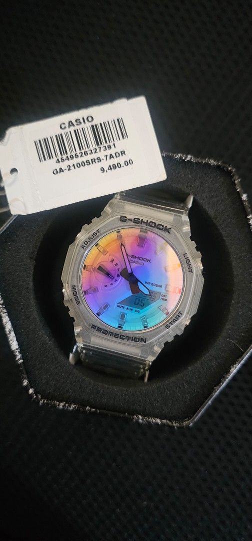 Casio G-Shock GA-2100SRS-7ADR (Category: Men's Watches) located in Quezon City. Submitted by tashadimps (Listing ID 1417127915, Image 1). Description: Authentic Casio G-Shock watch Features a unique iridescent dial and a transparent straps The model number is GA-2100SRS-7ADR Comes with its original box and tag Immerse yourself in brilliant iridescent color, the first-ever G- SHOCK with full-surface gradated crystal finish evoking reflected sunlig