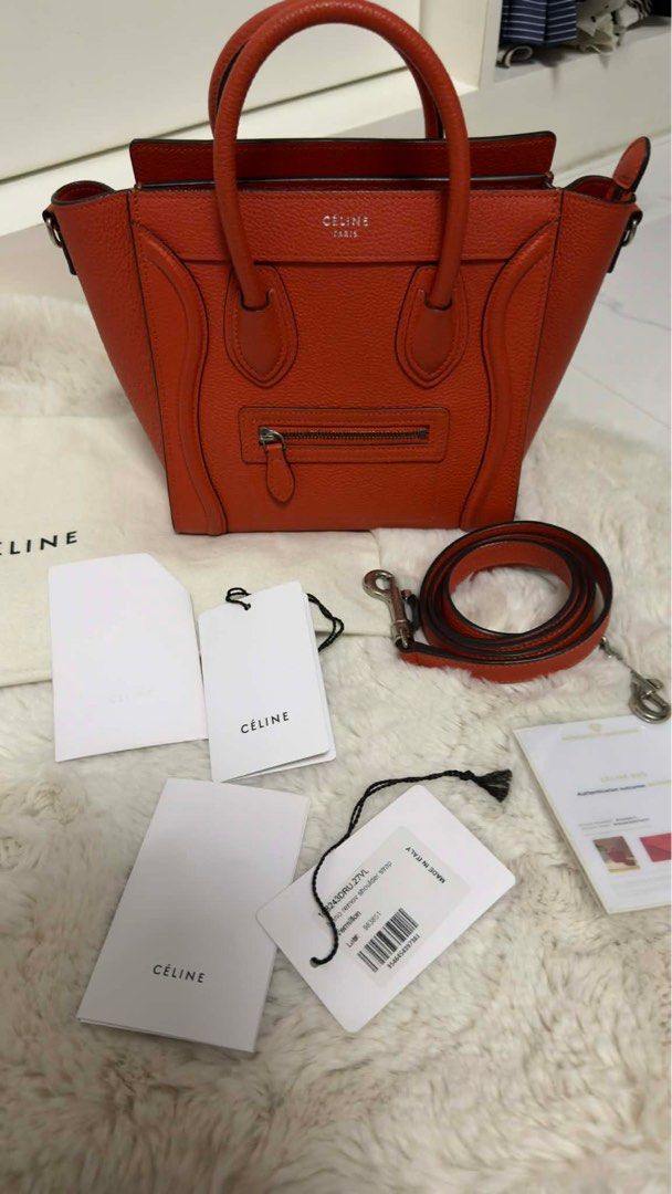 CELINE LUGGAGE NANO (Category: Luxury Bags & Wallets) located in Arayat. Submitted by cjscolis (Listing ID 1417172634, Image 1). Description: - Authentic Celine Luggage Nano handbag - Color: Orange - Features a top handle and detachable shoulder strap - Zip closure - Includes original tags, dust bag, and authenticity card - Interior has a small pocket - Made in Italy USED SEVERAL TIMES ONLY SLIGHTLY NEGOTIABLE.