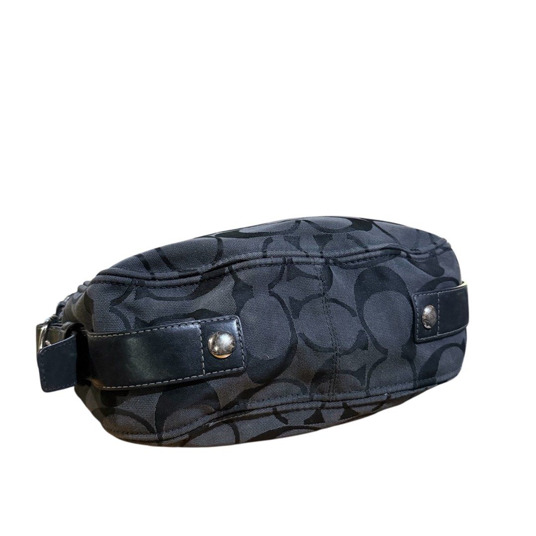 Coach Signature Hobo Bag (Category: Luxury Bags & Wallets) located in Kabacan. Submitted by rags2penny.phl (Listing ID 1417140982, Image 3). Description: - Authentic Coach Signature Hobo bag - Black and gray signature pattern - Black leather trim and straps - Includes top handle and shoulder strap - Model number: E06K-10249 - Silver-tone hardware - Coach hangtag included - Spacious interior issue : sign of usage.
