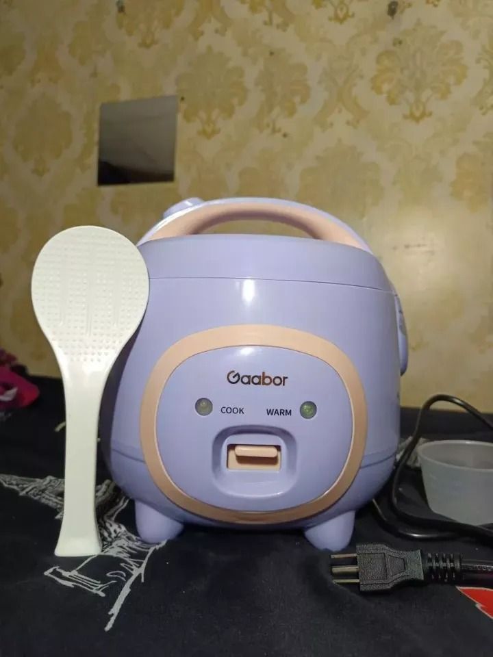 Gaabor Mini Mechanical Rice Cooker 2L (Category: Cookers) located in Caloocan City. Submitted by tckingdom_2 (Listing ID 1417055646, Image 3). Description: 【Features】 ① Cute design Mini size ② 2L capacity can cook 5 cups of rice one time -Suitable for 1-3 person family ③ Steam and cook at the same time to save cooking time -The product is equipped with a steamer and a rice spoon Aluminum plate heating plate, heating at the bottom ④ For Solo Dinin