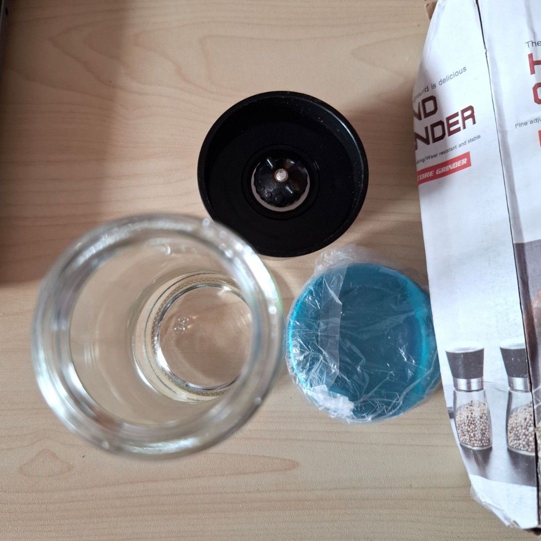 Hand Ceramic Core Grinder (Category: Coffee & Tea Tableware) located in Quezon City. Submitted by ana-chan (Listing ID 1417059542, Image 2). Description: - Ceramic core for efficient grinding - Includes glass container - Stainless steel top - Easy to use - Suitable for various spices - Box included.